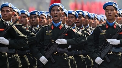 Vietnamese soldiers take part in a parade marking the 50th anniversary of the fall of Saigon and the end of the Vietnam War in Ho Chi Minh City on April 30, 2025. Vietnam held its biggest celebration of the fall of Saigon on its 50th anniversary on April 30, including Chinese troops for the first time after Xi Jinping visited to portray Beijing as a more reliable partner than Washington. (Photo by NHAC NGUYEN / AFP) (AFP) Vietnamese soldiers take part in a parade marking the 50th anniversary of the fall of Saigon and the end of the Vietnam War in Ho Chi Minh City on April 30, 2025. Vietnam held its biggest celebration of the fall of Saigon on its 50th anniversary on April 30, including Chinese troops for the first time after Xi Jinping visited to portray Beijing as a more reliable partner than Washington. (Photo by NHAC NGUYEN / AFP) (AFP)