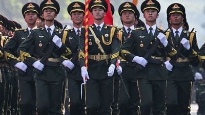 Chinese soldiers take part in a parade marking the 50th anniversary of the fall of Saigon and the end of the Vietnam War in Ho Chi Minh City on April 30, 2025. Vietnam held its biggest celebration of the fall of Saigon on its 50th anniversary on April 30, including Chinese troops for the first time after Xi Jinping visited to portray Beijing as a more reliable partner than Washington. (Photo by NHAC NGUYEN / AFP) (AFP) Chinese soldiers take part in a parade marking the 50th anniversary of the fall of Saigon and the end of the Vietnam War in Ho Chi Minh City on April 30, 2025. Vietnam held its biggest celebration of the fall of Saigon on its 50th anniversary on April 30, including Chinese troops for the first time after Xi Jinping visited to portray Beijing as a more reliable partner than Washington. (Photo by NHAC NGUYEN / AFP) (AFP)