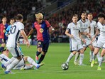 FC Barcelona's Lamine Yamal in action.
