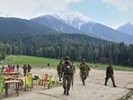 Security officers inspect the site a day after where suspected terrorists opened fire at tourists in Pahalgam. (AP) Security officers inspect the site a day after where suspected terrorists opened fire at tourists in Pahalgam. (AP)