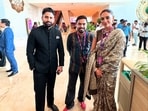 Naga Chaitanya and Sobhita Dhulipala pose with a fan at WAVES 2025.
