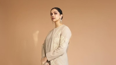 Deepika chose a Masaba Gupta suit in beige, her first look of the day. She later changed to a black suit for a panel discussion with Shah Rukh Khan. Deepika chose a Masaba Gupta suit in beige, her first look of the day. She later changed to a black suit for a panel discussion with Shah Rukh Khan. 