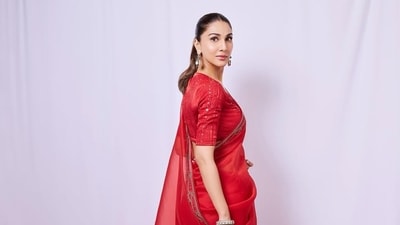 Vaani Kapoor went for the bright red option in a pristine saree. Vaani Kapoor went for the bright red option in a pristine saree.