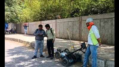 Ground Penetrating Radar Survey being carried out by staff of GMRLin Gurugram on Thursday. (HT PHOTO) Ground Penetrating Radar Survey being carried out by staff of GMRLin Gurugram on Thursday. (HT PHOTO)