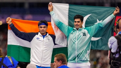 Silver medallist India's Neeraj Chopra and Gold medallist Pakistan's Arshad Nadeem celebrate after the men's javelin throw final at the 2024 Summer Olympics, in Paris (PTI) Silver medallist India's Neeraj Chopra and Gold medallist Pakistan's Arshad Nadeem celebrate after the men's javelin throw final at the 2024 Summer Olympics, in Paris (PTI)