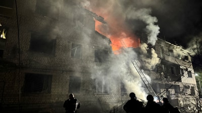 Rescuers work at the site of an apartment building hit by a Russian drone strike, amid Russia's attack on Ukraine. (REUTERS)