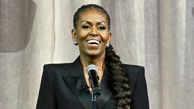 NATIONAL HARBOR, MARYLAND - APRIL 30: Former First Lady Michelle Obama welcomes the audience at Matriarch - An Evening with Tina Knowles at The Theater at MGM National Harbor on April 30, 2025 in National Harbor, Maryland. Shannon Finney/Getty Images/AFP (Photo by Shannon Finney / GETTY IMAGES NORTH AMERICA / Getty Images via AFP) (Getty Images via AFP) NATIONAL HARBOR, MARYLAND - APRIL 30: Former First Lady Michelle Obama welcomes the audience at Matriarch - An Evening with Tina Knowles at The Theater at MGM National Harbor on April 30, 2025 in National Harbor, Maryland. Shannon Finney/Getty Images/AFP (Photo by Shannon Finney / GETTY IMAGES NORTH AMERICA / Getty Images via AFP) (Getty Images via AFP)