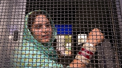 Minal Khan, a Pakistani national married in India, is being brought to the Integrated Check Post (ICP) at the Attari-Wagah border from Jammu by the Jammu and Kashmir Police to send her back to her country, near Amritsar, Tuesday, April 29, 2025. (PTI) Minal Khan, a Pakistani national married in India, is being brought to the Integrated Check Post (ICP) at the Attari-Wagah border from Jammu by the Jammu and Kashmir Police to send her back to her country, near Amritsar, Tuesday, April 29, 2025. (PTI)