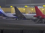 Flights delayed at Delhi airport due to rain and thunderstorms.