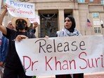 Mapheze Saleh, right, wife of arrested and detained Georgetown University scholar Badar Khan Suri, holds a sign calling for her husband's release Mapheze Saleh, right, wife of arrested and detained Georgetown University scholar Badar Khan Suri, holds a sign calling for her husband's release