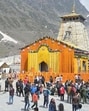 People gather at Kedarnath Dham after the portals were opened to devotees on Friday. (HT Photo) People gather at Kedarnath Dham after the portals were opened to devotees on Friday. (HT Photo)