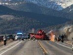Rescue workers arrive to the scene after a deadly collision between a pickup truck and tour van near Henry’s Lake State Park in eastern Idaho on Thursday, May 1, 2025.   (Roger Merrill via A)