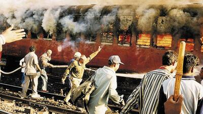 59 Hindu pilgrims and kar sevaks returning from Ayodhya on board the Sabarmati Express were killed when a group of people set fire to the train near the Godhra railway station in Gujarat (AP FILE) 59 Hindu pilgrims and kar sevaks returning from Ayodhya on board the Sabarmati Express were killed when a group of people set fire to the train near the Godhra railway station in Gujarat (AP FILE)