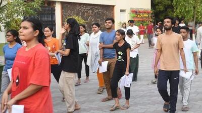 All candidates will undergo mandatory frisking before entering the examination halls. Both male and female frisking personnel have been assigned to inspect the candidates for any prohibited items, including mobile phones, smart watches, electronic gadgets, hidden notes, or communication devices. (HT Photo) All candidates will undergo mandatory frisking before entering the examination halls. Both male and female frisking personnel have been assigned to inspect the candidates for any prohibited items, including mobile phones, smart watches, electronic gadgets, hidden notes, or communication devices. (HT Photo)