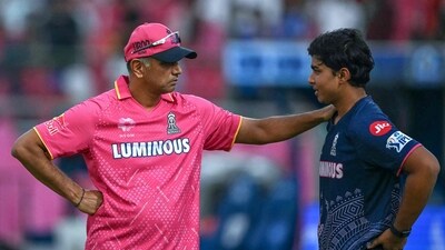 Rajasthan Royals' Vaibhav Suryavanshi (R) speaks with team's head coach Rahul Dravid (AFP) Rajasthan Royals' Vaibhav Suryavanshi (R) speaks with team's head coach Rahul Dravid (AFP)