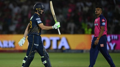 Gujarat Titans' Jos Buttler acknowledges the crowd after completing his half century vs Rajasthan Royals. (REUTERS)