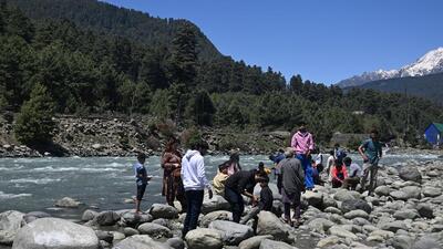 Indian tourists are pictured in Pahalgam south of Srinagar. (AFP)
