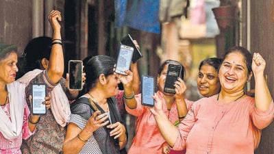 Mumbai, India - Aug. 16, 2024: Women expressing their happiness over the deposit of ?3000 in women's accounts under the Maharashtra Government's Ladki Bahin Yojana in Mumbai, India, on Friday, August 16, 2024. (Photo by Satish Bate/ Hindustan Times) (Hindustan Times) Mumbai, India - Aug. 16, 2024: Women expressing their happiness over the deposit of ?3000 in women's accounts under the Maharashtra Government's Ladki Bahin Yojana in Mumbai, India, on Friday, August 16, 2024. (Photo by Satish Bate/ Hindustan Times) (Hindustan Times)
