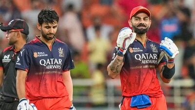 Virat Kohli, right, wants to get to know Jitesh Sharma better (PTI) Virat Kohli, right, wants to get to know Jitesh Sharma better (PTI)