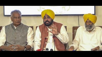 Punjab CM Bhagwant Mann with state BJP president Sunil Jakhar (left) and SAD leader Balwinder Singh Bhundar during a joint-press conference in Chandigarh on Friday. (PTI) Punjab CM Bhagwant Mann with state BJP president Sunil Jakhar (left) and SAD leader Balwinder Singh Bhundar during a joint-press conference in Chandigarh on Friday. (PTI)