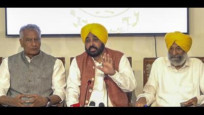 Punjab chief minister Bhagwant Mann with state BJP president Sunil Jakhar, left, addressing a joint press conference after the all-party meeting on the sharing of river waters with Haryana, in Chandigarh on Friday. (PTI Photo) Punjab chief minister Bhagwant Mann with state BJP president Sunil Jakhar, left, addressing a joint press conference after the all-party meeting on the sharing of river waters with Haryana, in Chandigarh on Friday. (PTI Photo)