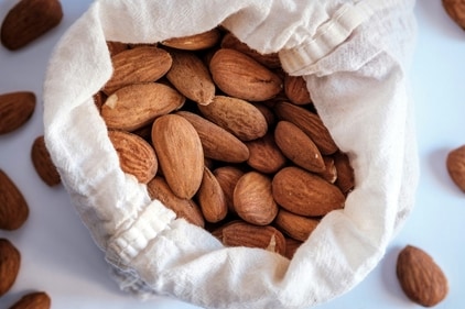 Almonds are a powerhouse of nutrients that help with hair growth and nutrition (Pexels) Almonds are a powerhouse of nutrients that help with hair growth and nutrition (Pexels)