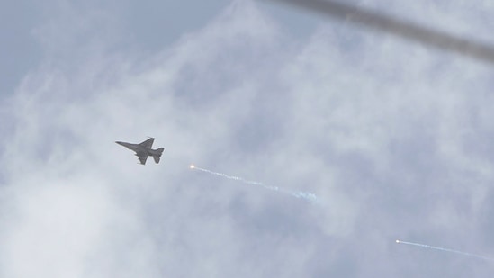 An Israeli fighter jet fires a rocket as it flies over an area near the Syrian capital Damascus on April 30, 2025. Syrian state media said Israel conducted strikes on April 30, outside Damascus, where deadly sectarian clashes between security forces and local Druze fighters erupted overnight. (AFP)