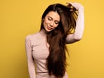 Frequent heat styling and tight hairstyles can weaken the hair shaft and damage follicles, leading to breakage and traction alopecia. Use heat protectants, loosen your hairstyles, and give your scalp breaks. (Freepik) Frequent heat styling and tight hairstyles can weaken the hair shaft and damage follicles, leading to breakage and traction alopecia. Use heat protectants, loosen your hairstyles, and give your scalp breaks. (Freepik)