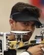 Swapnil Kusale competes in the 50 Rifle 3 Positions men's final at the Paris Olympics. (AFP)