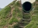 Images posted online reveal a basic staircase and a door carved into the back of the hill. 