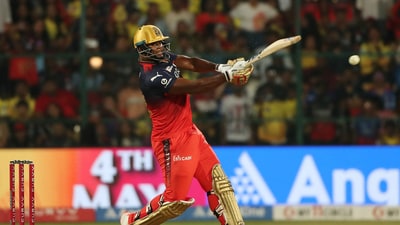 Royal Challengers Bengaluru' Romario Shepherd in action as he hits four runs (REUTERS)