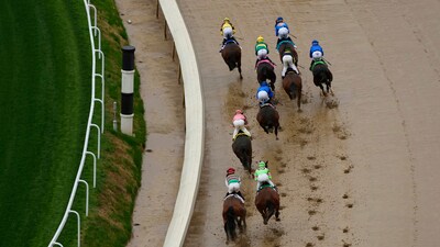 A race is run on a muddy track at Churchill Downs before the 151st running of the Kentucky Derby horse race Saturday, May 3, 2025, in Louisville, Ky. (AP Photo/Charlie Riedel) (AP) A race is run on a muddy track at Churchill Downs before the 151st running of the Kentucky Derby horse race Saturday, May 3, 2025, in Louisville, Ky. (AP Photo/Charlie Riedel) (AP)