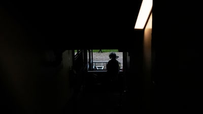 A race fan walks through the stands at Churchill Downs before the 151st running of the Kentucky Derby horse race Saturday, May 3, 2025, in Louisville, Ky. (AP Photo/Brynn Anderson) (AP) A race fan walks through the stands at Churchill Downs before the 151st running of the Kentucky Derby horse race Saturday, May 3, 2025, in Louisville, Ky. (AP Photo/Brynn Anderson) (AP)