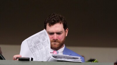 A person looks over a racing sheet at Churchill Downs before the 151st running of the Kentucky Derby horse race Saturday, May 3, 2025, in Louisville, Ky. (AP Photo/Brynn Anderson) (AP) A person looks over a racing sheet at Churchill Downs before the 151st running of the Kentucky Derby horse race Saturday, May 3, 2025, in Louisville, Ky. (AP Photo/Brynn Anderson) (AP)