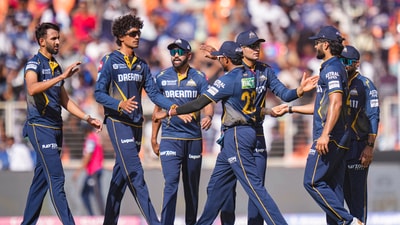 Prasidh Krishna celebrates a wicket with Gujarat Titans teammates. (PTI) Prasidh Krishna celebrates a wicket with Gujarat Titans teammates. (PTI)