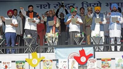 Punjab governor Gulab Chand Kataria (fourth from left) administering the pledge against drugs as his Haryana counterpart Bandaru Dattatreya and chief ministers Bhagwant Mann and Nayab Singh Saini join in after the march in Chandigarh on Saturday. (Ravi Kumar/HT) Punjab governor Gulab Chand Kataria (fourth from left) administering the pledge against drugs as his Haryana counterpart Bandaru Dattatreya and chief ministers Bhagwant Mann and Nayab Singh Saini join in after the march in Chandigarh on Saturday. (Ravi Kumar/HT)