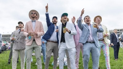 Fans watch races ahead of the 151st running of the Kentucky Derby at Churchill Downs on May 3, 2025, in Louisville, Kentucky. (Photo by LEANDRO LOZADA / AFP) (AFP) Fans watch races ahead of the 151st running of the Kentucky Derby at Churchill Downs on May 3, 2025, in Louisville, Kentucky. (Photo by LEANDRO LOZADA / AFP) (AFP)