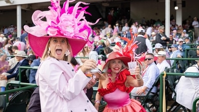 Attendees wearing colorful hats enjoy a preview day event ahead of the 151th running of the Kentucky Derby at Churchill Downs on May 2, 2025, in Louisville, Kentucky. (Photo by LEANDRO LOZADA / AFP) (AFP) Attendees wearing colorful hats enjoy a preview day event ahead of the 151th running of the Kentucky Derby at Churchill Downs on May 2, 2025, in Louisville, Kentucky. (Photo by LEANDRO LOZADA / AFP) (AFP)