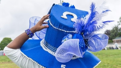 Fans don blue hat for the 151st running of the Kentucky Derby at Churchill Downs on May 3, 2025, in Louisville, Kentucky. (Photo by LEANDRO LOZADA / AFP) (AFP) Fans don blue hat for the 151st running of the Kentucky Derby at Churchill Downs on May 3, 2025, in Louisville, Kentucky. (Photo by LEANDRO LOZADA / AFP) (AFP)