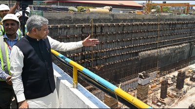 Railway Minister Ashwini Vaishnaw reviewed the progress of the under-construction underground bullet train station at the Bandra Kurla Complex (BKC) in Mumbai on Saturday. (Hindustan Times) Railway Minister Ashwini Vaishnaw reviewed the progress of the under-construction underground bullet train station at the Bandra Kurla Complex (BKC) in Mumbai on Saturday. (Hindustan Times)