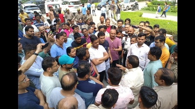 Residents of Prateek Grand Society in Ghaziabad met UP minister Narendra Kashyap on Saturday to raise concerns about dirty water flooding the basement, following a major drain breach in the area. (Sakib Ali/HT Photo) Residents of Prateek Grand Society in Ghaziabad met UP minister Narendra Kashyap on Saturday to raise concerns about dirty water flooding the basement, following a major drain breach in the area. (Sakib Ali/HT Photo)