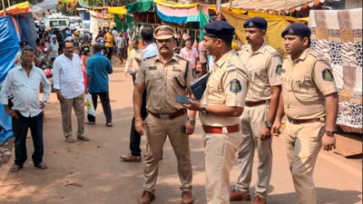 Police personnel at the site after a stampede broke out at a village during a temple festival, in North Goa district, Saturday, May 3, 2025 (PTI) Police personnel at the site after a stampede broke out at a village during a temple festival, in North Goa district, Saturday, May 3, 2025 (PTI)