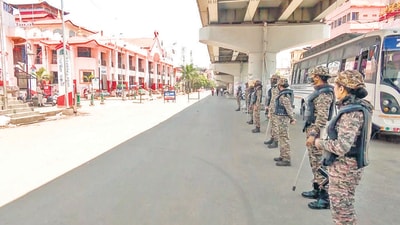 Security personnel stand guard as markets remain closed to mark two years of the conflict, in Imphal on Saturday. (ANI) Security personnel stand guard as markets remain closed to mark two years of the conflict, in Imphal on Saturday. (ANI)
