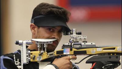 Swapnil Kusale competes in the 50 Rifle 3 Positions men's final at the Paris Olympics. (AFP)