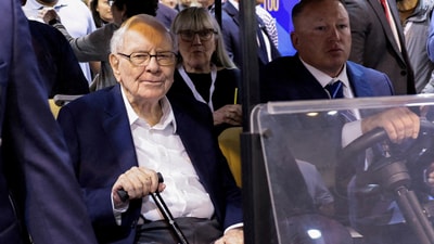 Berkshire Hathaway Chairman Warren Buffett attends the Berkshire Hathaway Inc annual shareholders' meeting in Omaha (REUTERS)