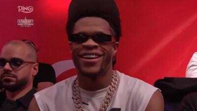Devin Haney’s viral reaction to Ryan Garcia’s KO loss to Rolly Romero says it all. (X/Times Square, New York City)