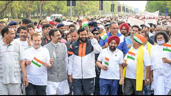 Haryana chief minister Nayab Singh Saini (centre) taking part in the walkathon under the Drug-Free Chandigarh Campaign, in Chandigarh on Saturday. (ANI Photo)