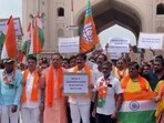The BJP workers held placards at Charminar in Hyderabad that read slogans like 'Pahalgam ka badla lekar rahenge,' and 'Go back, Pakistanis, go back.' The BJP workers held placards at Charminar in Hyderabad that read slogans like 'Pahalgam ka badla lekar rahenge,' and 'Go back, Pakistanis, go back.'