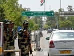 Border Security Force (BSF) soldiers stand guard as tourists arrive to watch the retreat ceremony at the India-Pakistan Wagah border post on the outskirts of Amritsar on April 24, 2025. Border Security Force (BSF) soldiers stand guard as tourists arrive to watch the retreat ceremony at the India-Pakistan Wagah border post on the outskirts of Amritsar on April 24, 2025.