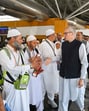 Jammu and Kashmir chief minister Omar Abdullah with Hajj pilgrims at Sheikh-ul-Alam International Airport in Srinagar on Sunday. (Photo: X)